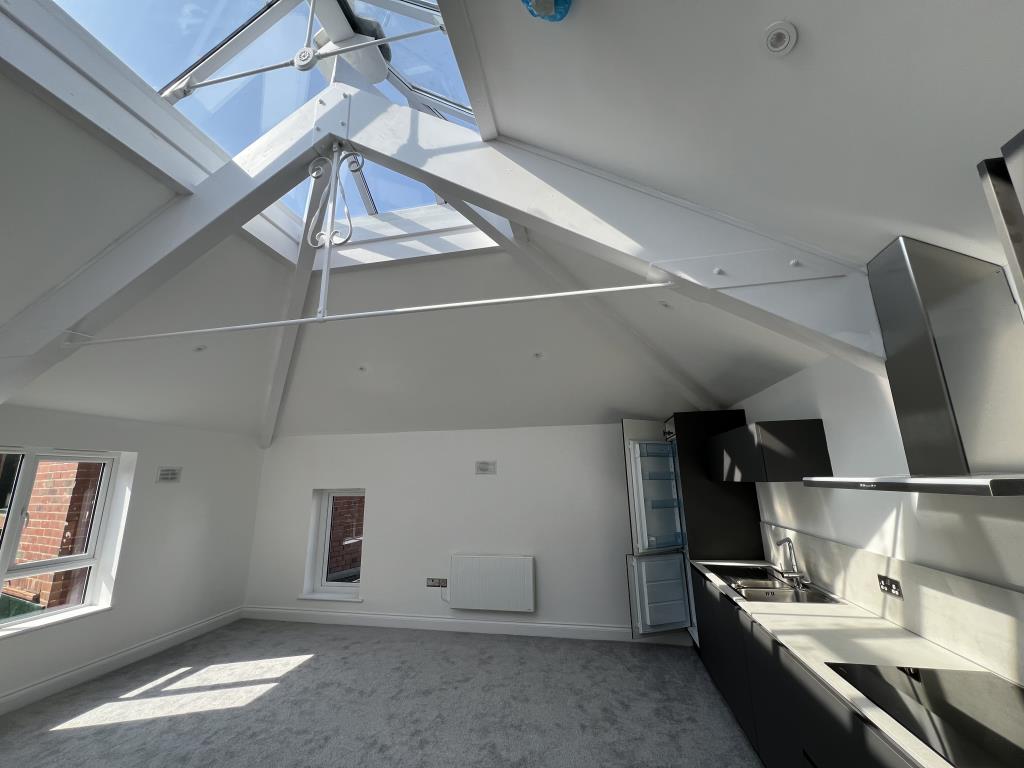 Lot: 14 - TOWN CENTRE FULLY REFURBISHED FIRST FLOOR FLAT - General view of living-dining-kitchen open plan living with sky light
